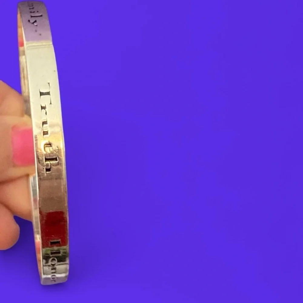 Silver tone family, solidarity, truth etc bracelet